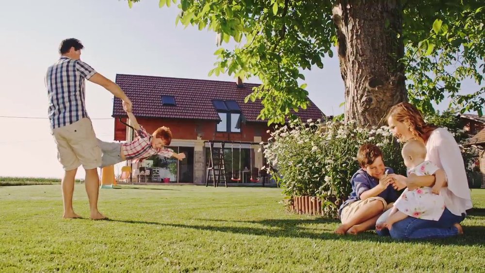 Family spending time in a yard